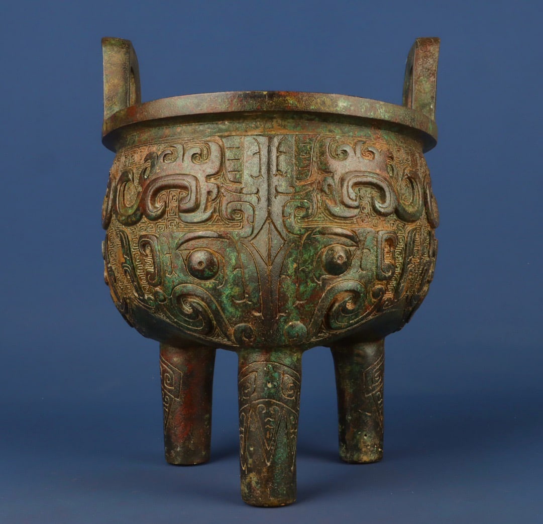An Exquisite Chinese Bronze animal faced round tripod: Size: Height 25 cm - Width 19 cm |Materials: Bronze |Style Dynasty: zhou dynasty |Attribution: 700-BC |Object: Bell