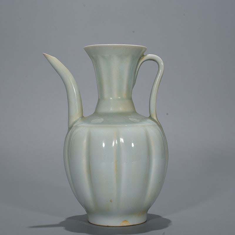 An Exquisite Chinese Hutian kiln shadow green glaze melon-shaped teapot: Size: Height 20 cm - Width 15 cm |Materials: Porcelain |Style Dynasty: Song Dynasty |Attribution: 10th-c |Object: teapot
