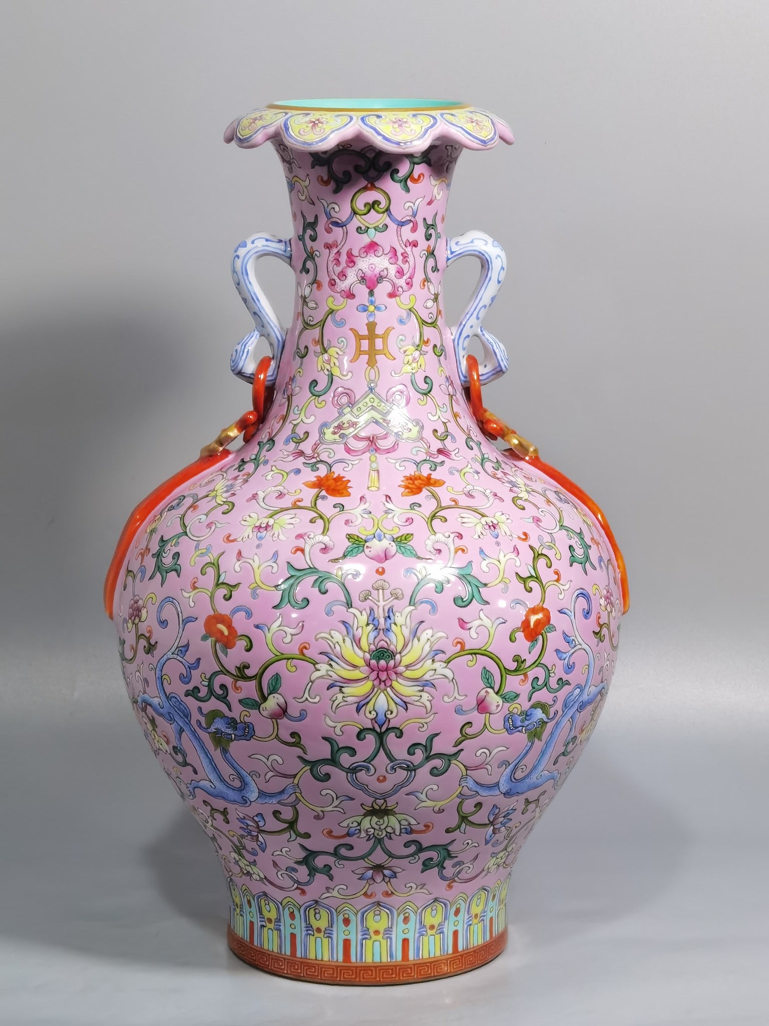 An Exquisite Chinese a pink ground pastel color Ruyi ear streamer flower mouth vase: Size: Height 32.6 cm - Width 19.2 cm |Materials: Porcelain |Style Dynasty: Qing dynasty |Inscription: Qianlong Mark |Object: vase