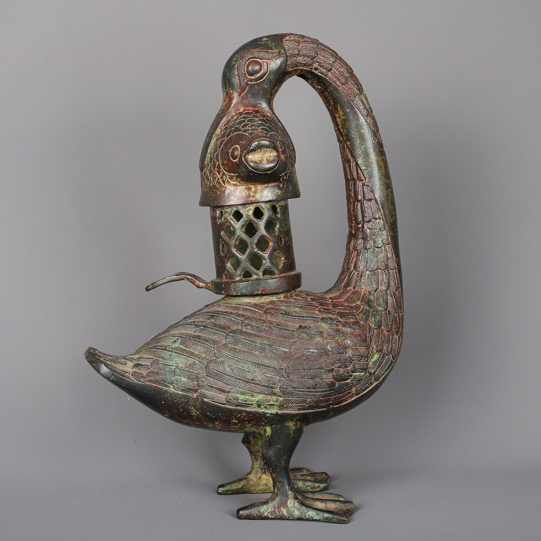 An Exquisite Chinese Bronze Swallow Fish Lamp: Size: Height 33 cm - Width 22 cm |Materials: Bronze |Style Dynasty: zhou dynasty |Attribution: 700-BC |Object: Bell
