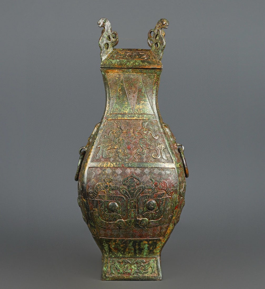 An Exquisite Chinese Bronze animal faced square vase: Size: Height 36 cm - Width 16 cm |Materials: Bronze |Style Dynasty: zhou dynasty |Attribution: 700-BC |Object: Bell