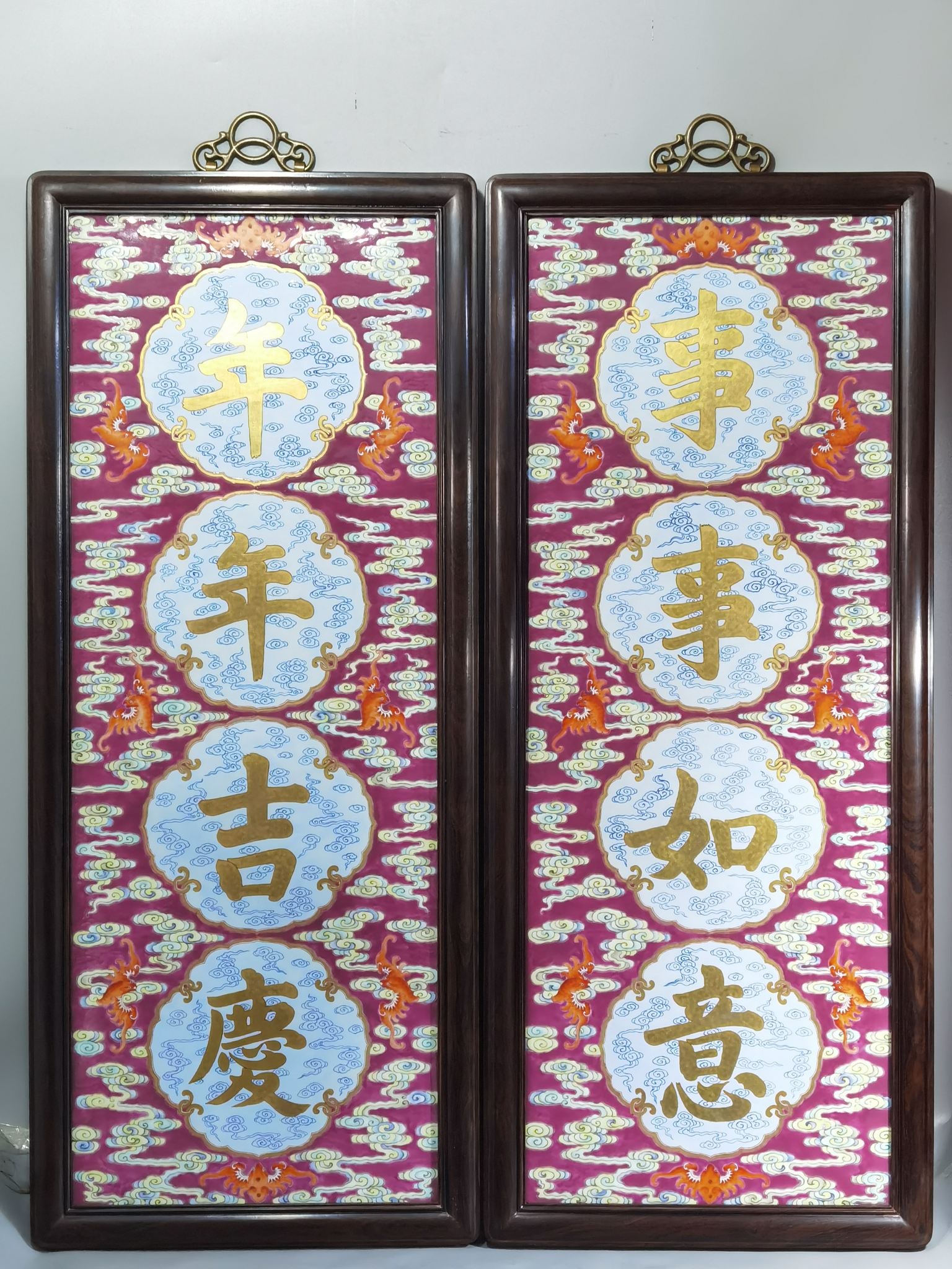 An Exquisite Chinese rouge ground pastel and gold good luck every year everything goes well a pair: Size: Height 83 cm - Width 34.5 cm |Materials: Porcelain |Style Dynasty: Qing dynasty |Inscription: Qianlong Mark |Object: frame
