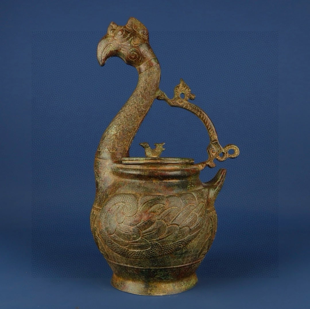 An Exquisite Chinese Bronze Dragon and Phoenix Pot: Size: Height 42 cm - Width 24 cm |Materials: Bronze |Style Dynasty: Han dynasty |Attribution: 1st to 3rd-C |Object: Bell