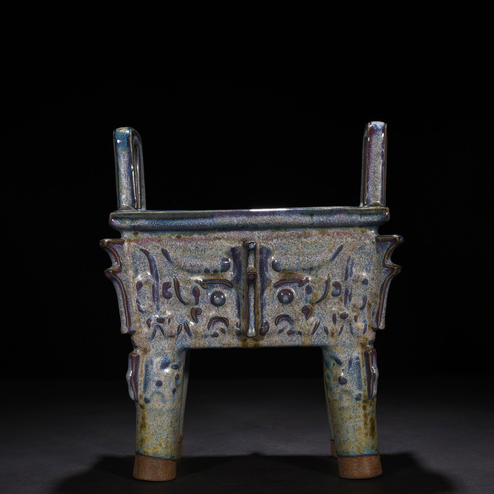 An Exquisite Chinese Jun kiln Jun glazed square tripod with Taotie pattern: Size: Height 31 cm - Width 26 cm |Materials: Porcelain |Style Dynasty: Song Dynasty |Attribution: 10th-c |Object: tripod