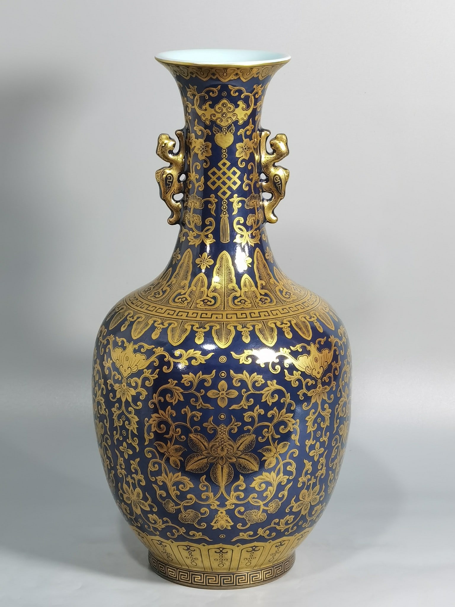 An Exquisite Chinese a blue-painted golden treasure pattern with a double-dragon ear and a: Size: Height 34.2 cm - Width 17.5 cm |Materials: Porcelain |Style Dynasty: Qing dynasty |Inscription: Qianlong Mark |Object: bottle