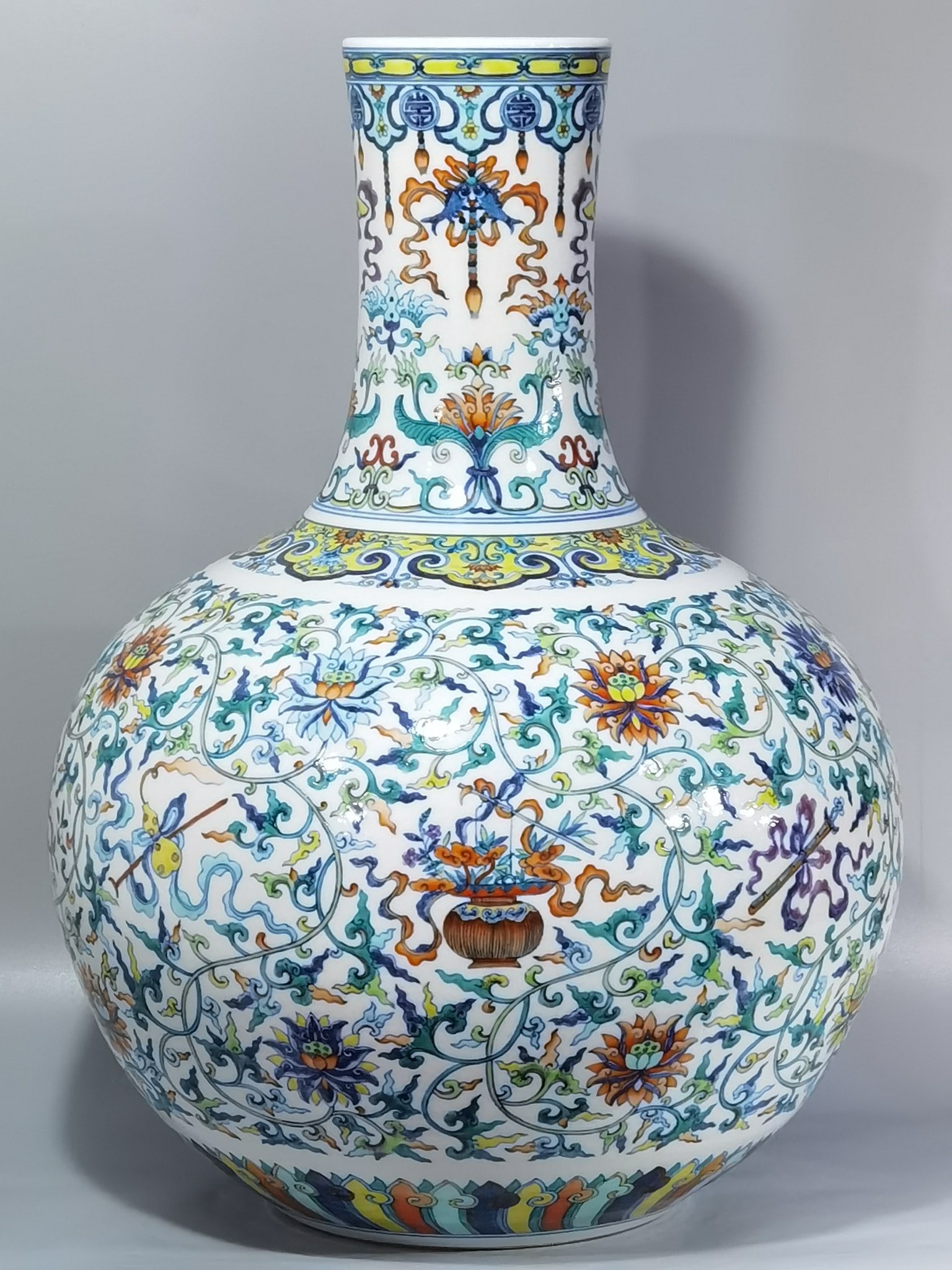An Exquisite Chinese blue and white doucai passion flower auspicious occasion eight treasures: Size: Height 53.5 cm - Width 38.5 cm |Materials: Porcelain |Style Dynasty: Qing dynasty |Inscription: Qianlong Mark |Object: vase