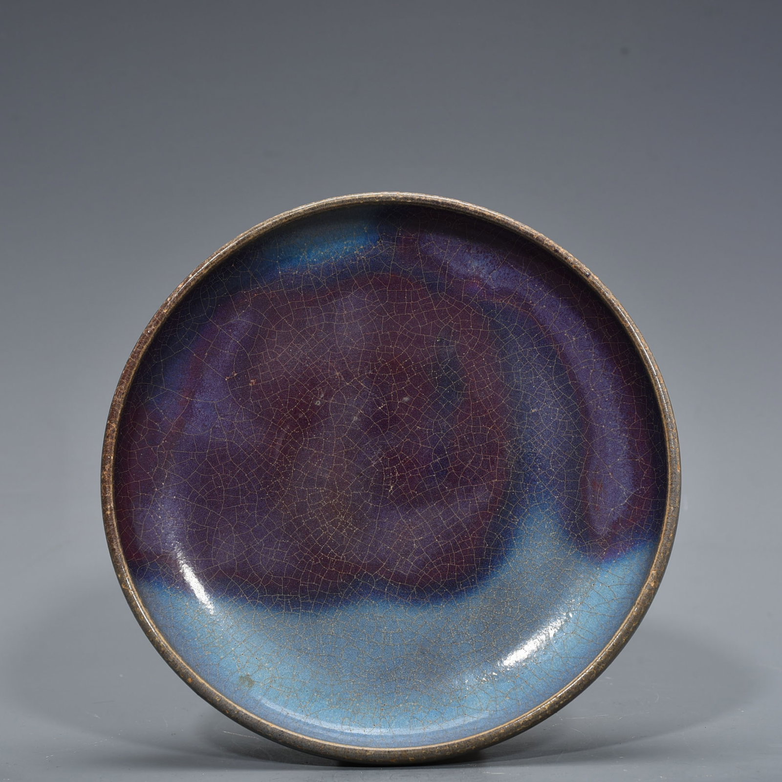 An Exquisite Chinese Jun kiln variable glaze plate: Size: Width 19.5 cm - Height 3.5 cm |Materials: Porcelain |Style Dynasty: Song Dynasty |Attribution: 10th-c |Object: plate