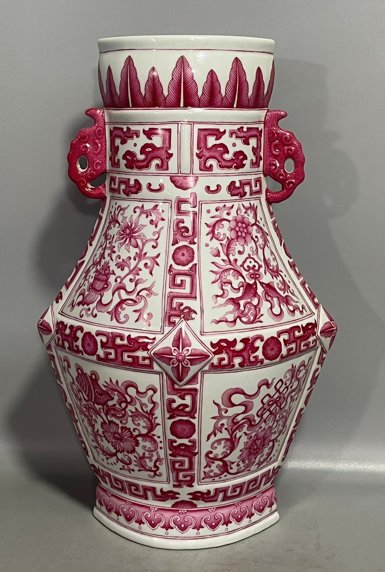 An Exquisite Chinese a carmine red eight-treasure pattern double-eared square vase: Size: Height 39.8 cm - Width 24 cm |Materials: Porcelain |Style Dynasty: Qing dynasty |Inscription: Qianlong Mark |Object: vase