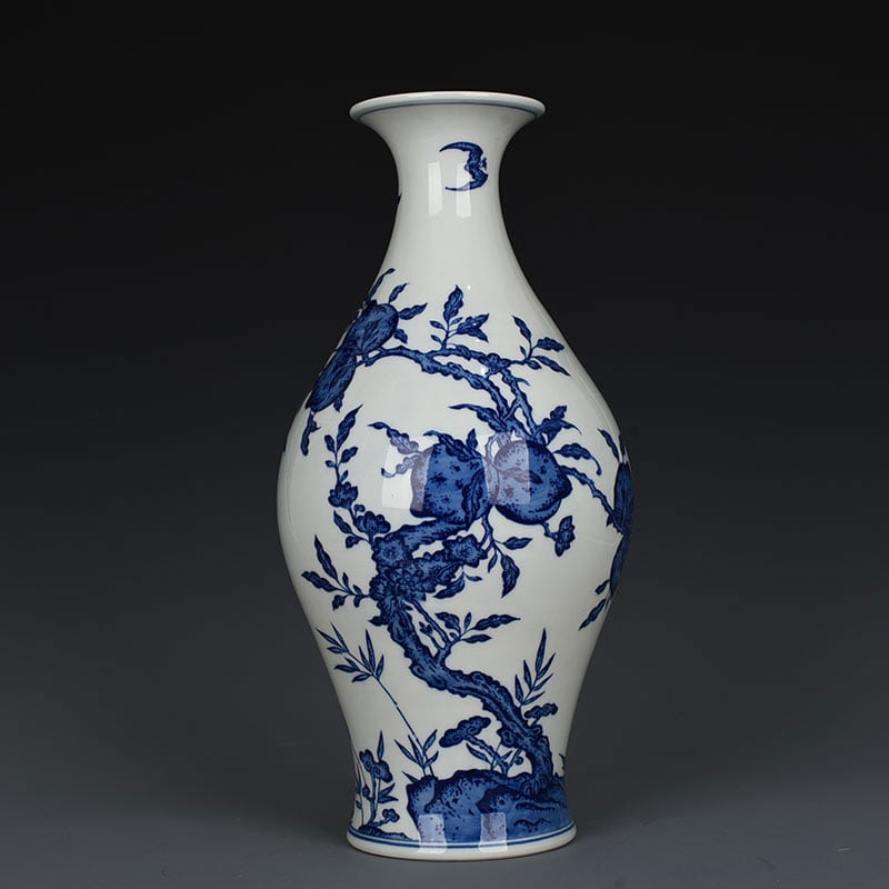 An Exquisite Chinese blue and white five blessings nine peaches longevity and olive vase: Size: Height 39 cm - Width 17 cm |Materials: Porcelain |Dynasty: Qing dynasty |Inscription: Qianlong Mark |Object: vase
