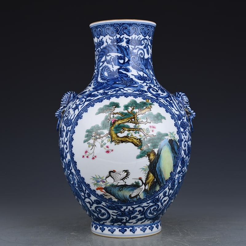 An Exquisite Chinese blue and white blooming pastel pine and crane longevity pattern ear-shaped vase: Size: Height 36 cm - Width 23 cm |Materials: Porcelain |Dynasty: Qing dynasty |Inscription: Qianlong Mark |Object: vase