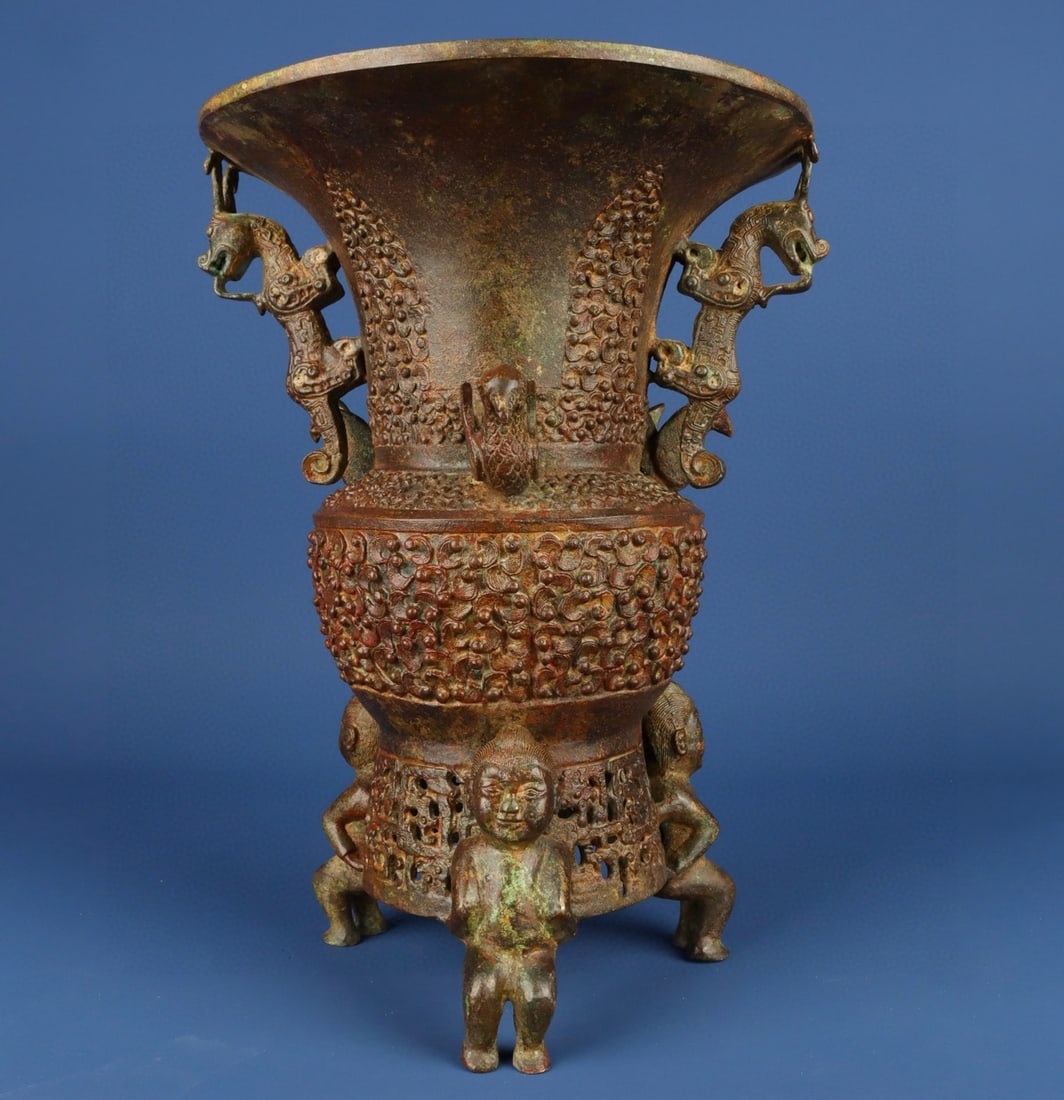 An Exquisite Chinese Bronze Double Dragon Circle Zun: Size: Height 33.5 cm - Width 23.5 cm |Materials: Bronze |Dynasty: zhou dynasty |Attribution: 700-BC |Object: Bell