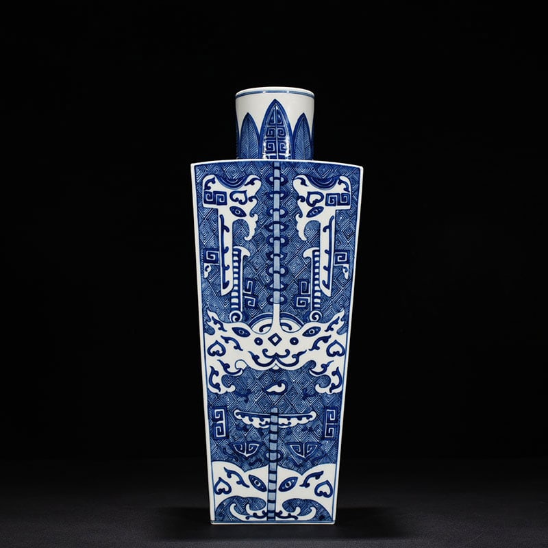 An Exquisite Chinese blue and white Taotie pattern plum vase: Size: Height 45 cm - Width 15.5 cm |Materials: Porcelain |Dynasty: Qing dynasty |Inscription: Qianlong Mark |Object: plum vase