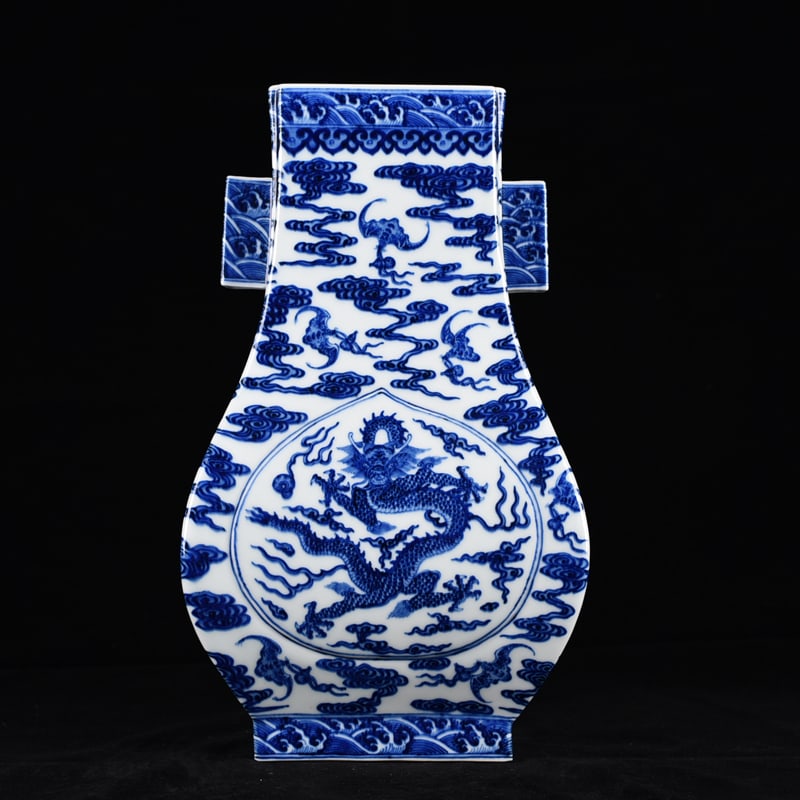 An Exquisite Chinese blue and white dragon pattern through-ear vase: Size: Height 34 cm - Width 20 cm |Materials: Porcelain |Dynasty: Qing dynasty |Inscription: Qianlong Mark |Object: vase