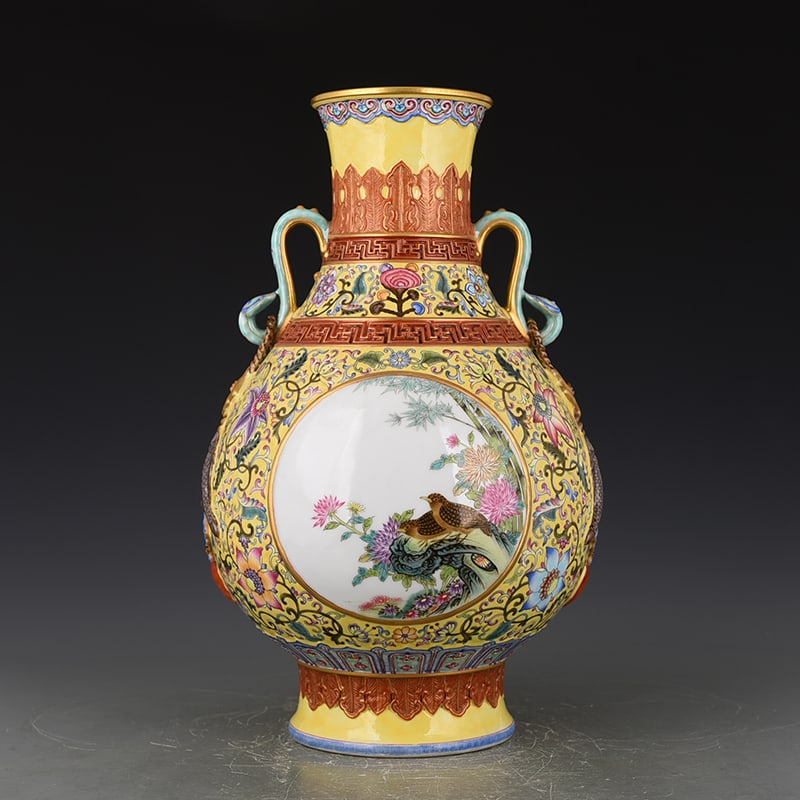 An Exquisite Chinese yellow ground enamel consecrated flower and bird Ruyi ear vase: Size: Height 42 cm - Width 26 cm |Materials: Porcelain |Dynasty: Qing dynasty |Inscription: Qianlong Mark |Object: vase