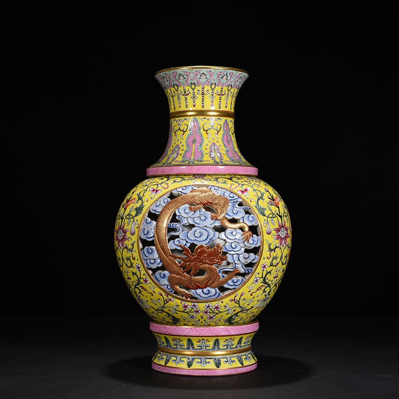 An Exquisite Chinese yellow ground enamel hollow cloud and dragon pattern revolving vase: Size: Height 38 cm - Width 22 cm |Materials: Porcelain |Dynasty: Qing dynasty |Inscription: Qianlong Mark |Object: vase