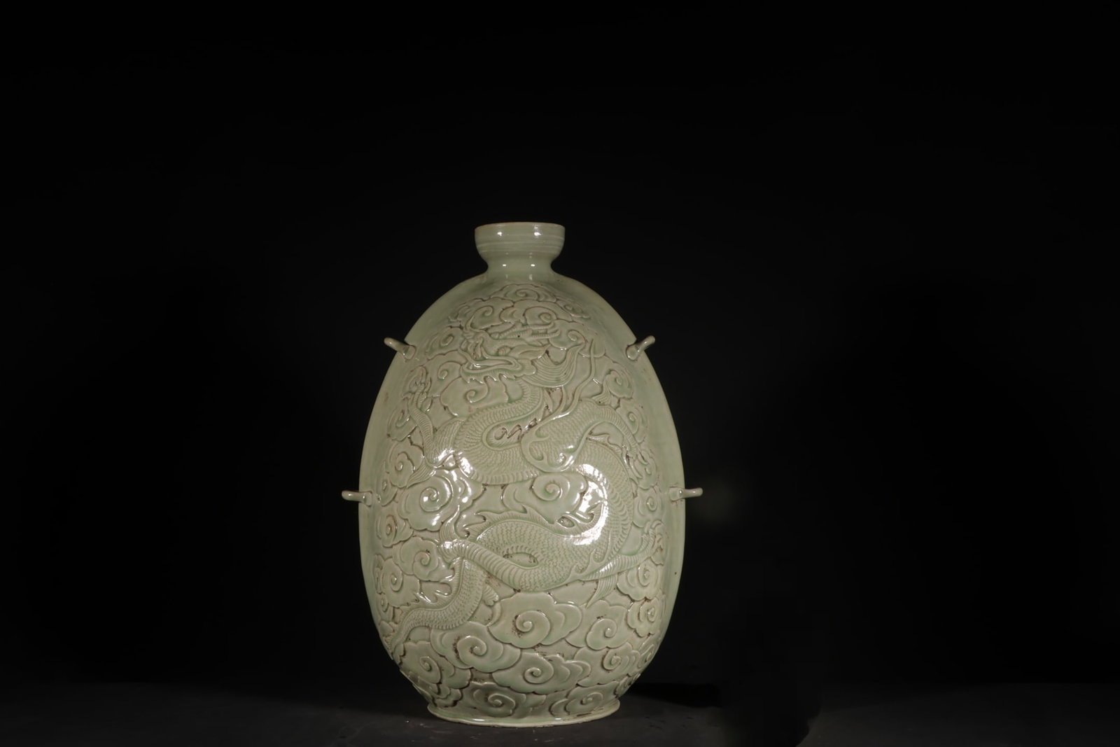 An Exquisite Chinese Yue kiln embossed cloud and dragon pattern threaded teapot: Size: Height 30.8 cm - Width 23.5 cm |Materials: Porcelain |Dynasty: Song dynasty |Inscription: 10th-c |Object: teapot