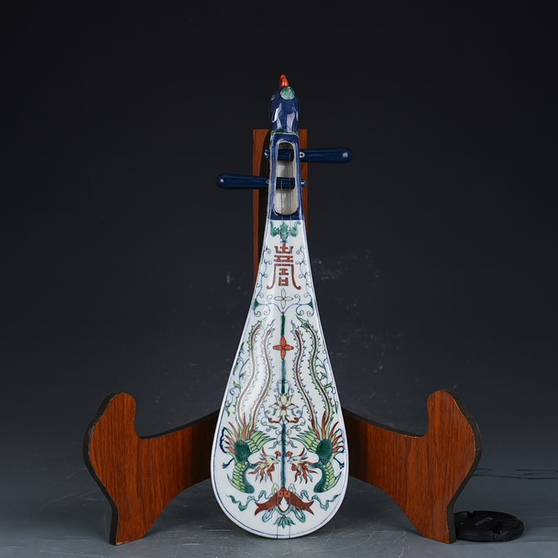 An Exquisite Chinese doucai phoenix pattern porcelain pipa: Size: Width 37.5 cm - Height 11 cm |Materials: Porcelain |Dynasty: Qing dynasty |Inscription: Yongzheng Mark |Object: instument
