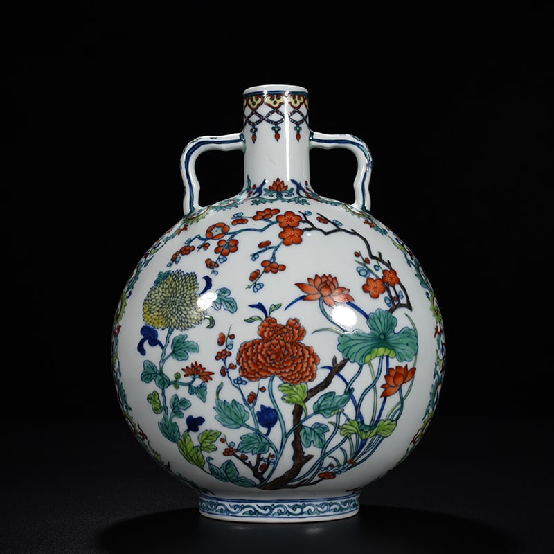 An Exquisite Chinese Doucai flat vase with four seasons flower pattern: Size: Height 32 cm - Width 25 cm |Materials: Porcelain |Dynasty: Qing dynasty |Inscription: Yongzheng Mark |Object: vase
