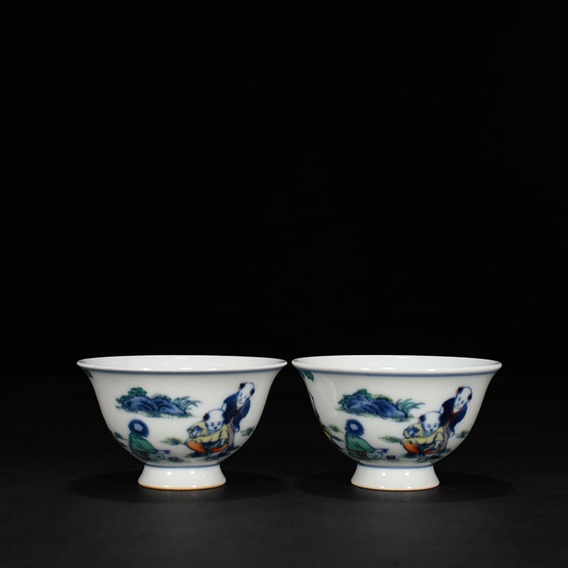 An Exquisite Chinese Doucai Baby Playing Cup: Size: Width 8 cm - Height 5 cm |Materials: Porcelain |Dynasty: Qing dynasty |Inscription: Yongzheng Mark |Object: cup