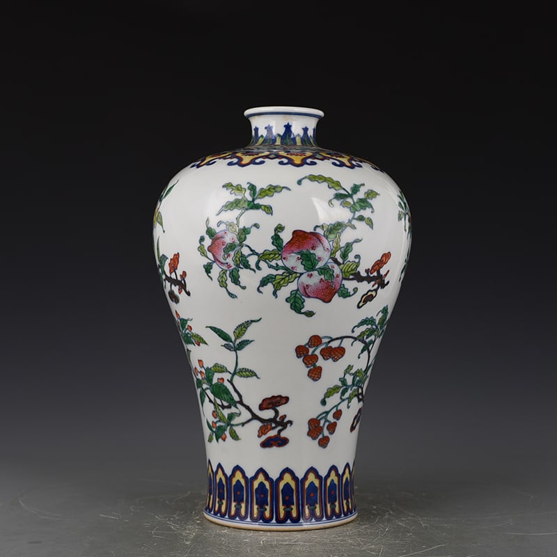 An Exquisite Chinese Doucai plum vase with folded branches flowers and fruits: Size: Height 36 cm - Width 24 cm |Materials: Porcelain |Dynasty: Qing dynasty |Inscription: Yongzheng Mark |Object: plum vase