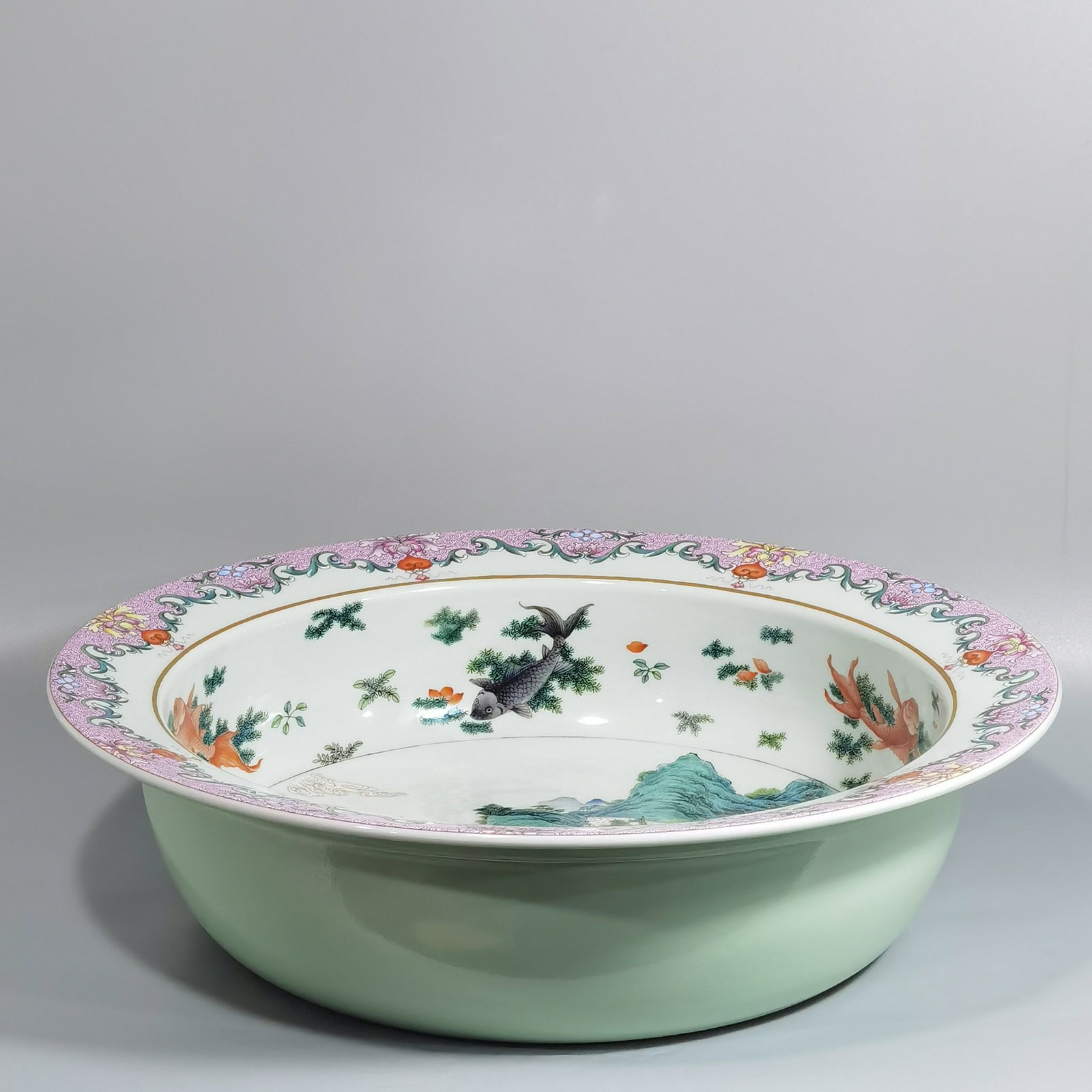 An Exquisite Chinese pastel fish and algae pattern landscape and figure basin: Size: Width 39.8 cm - Height 11 cm |Materials: Porcelain |Dynasty: Qing dynasty |Inscription: Qianlong Mark |Object: basin