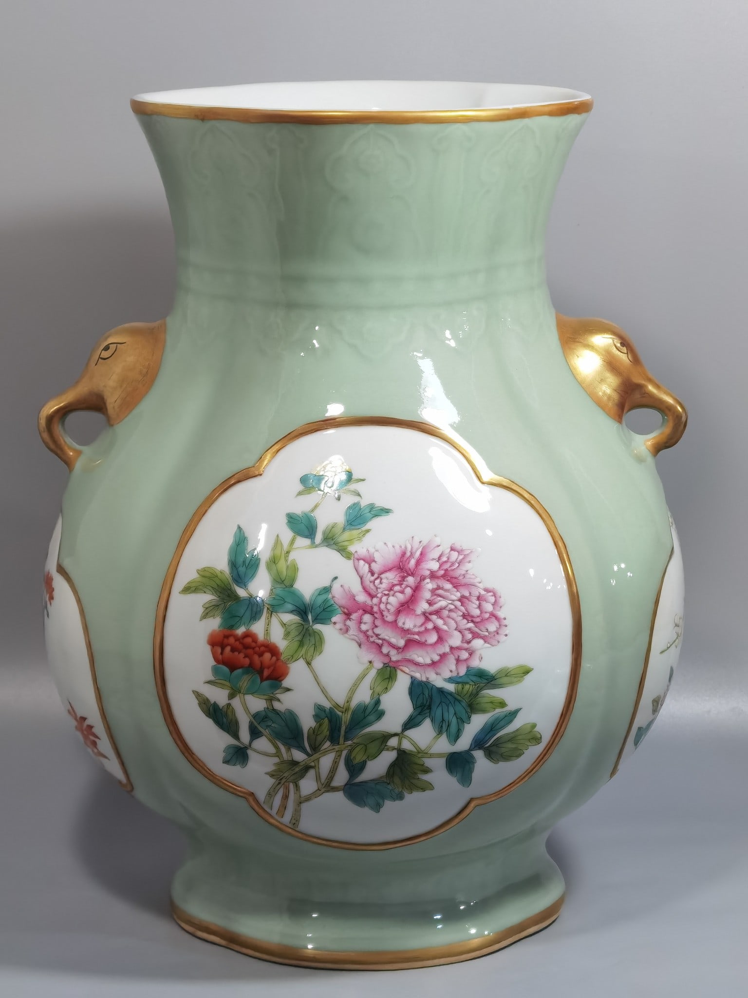 An Exquisite Chinese Pale celadon-glazed haitang shaped vase with elephant-head handles (1 of 9)