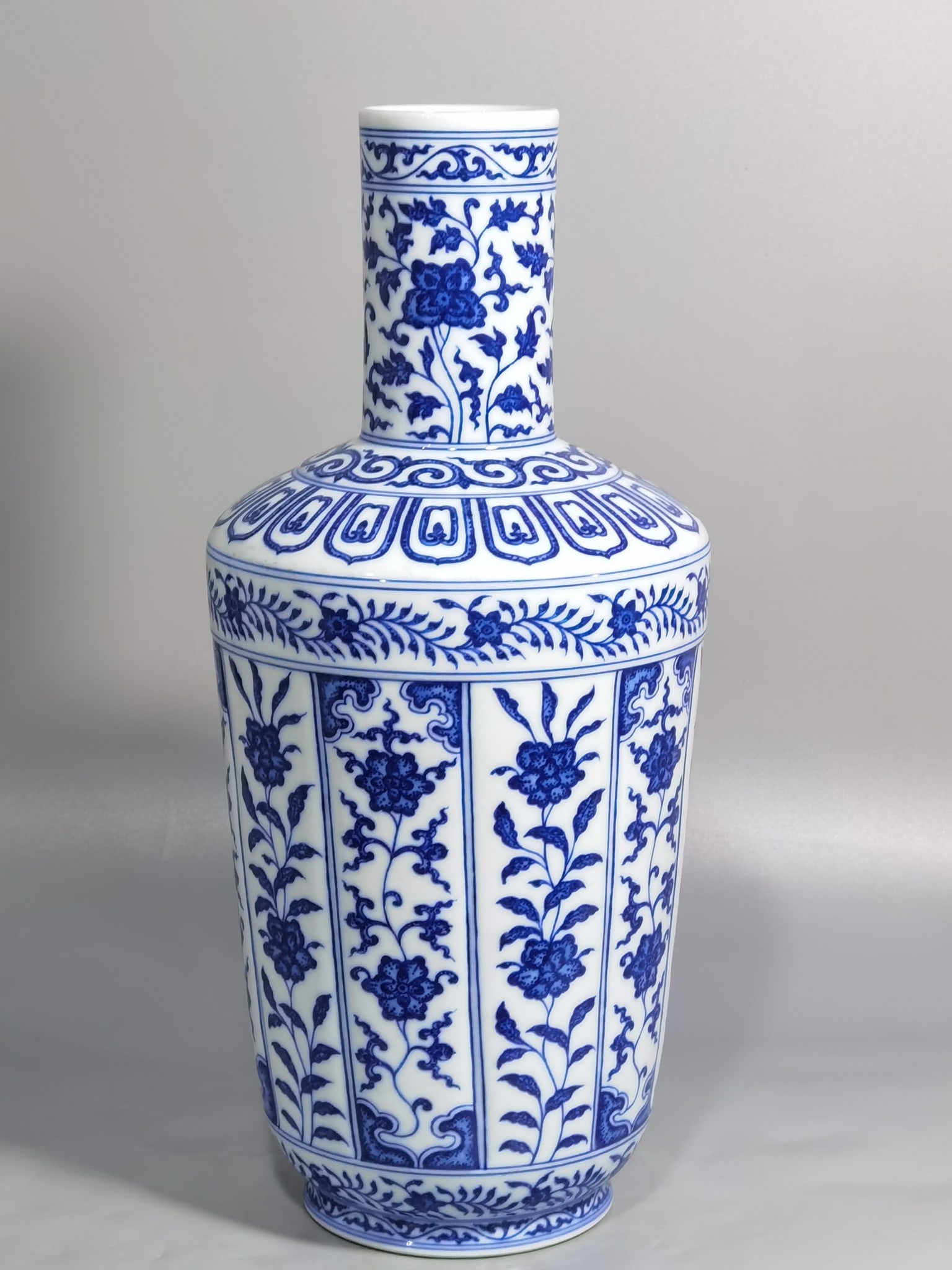 An Exquisite Chinese blue and white broken branch lotus pattern stick bottle: Size: Height 32.2 cm - Width 14.5 cm |Materials: Porcelain |Dynasty: Qing dynasty |Inscription: Qianlong Mark |Object: bottle