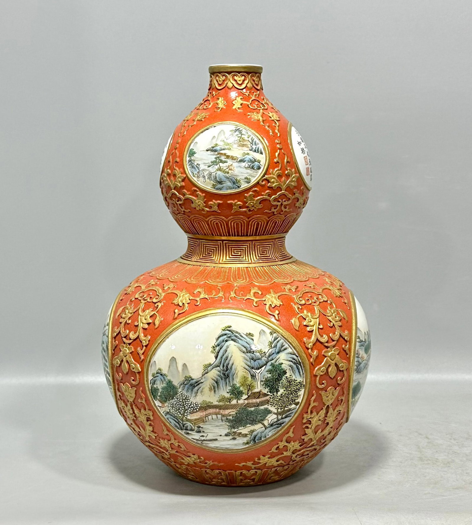 An Exquisite Chinese pastel coral red carved gold-painted flowers figures poems and gourd vase: Size: Height 27 cm - Width 18 cm |Materials: Porcelain |Dynasty: Qing dynasty |Inscription: Qianlong Mark |Object: vase