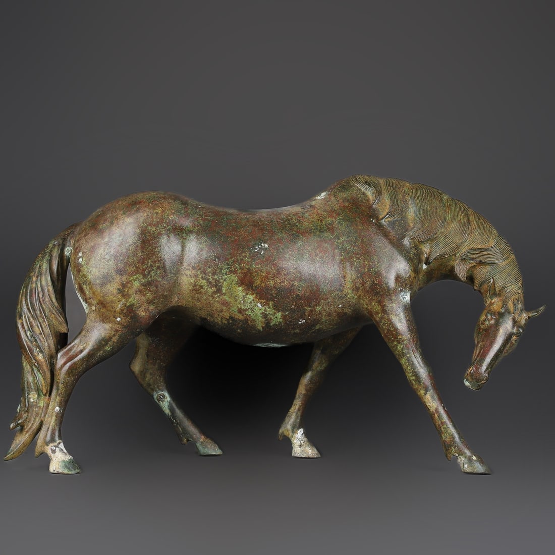 An Exquisite Chinese Bronze Horse Zun: Size: Height 32 cm - Width 55 cm |Materials: Bronze |Dynasty: Han dynasty |Attribution: 1st to 3rd-C |Object: Bell