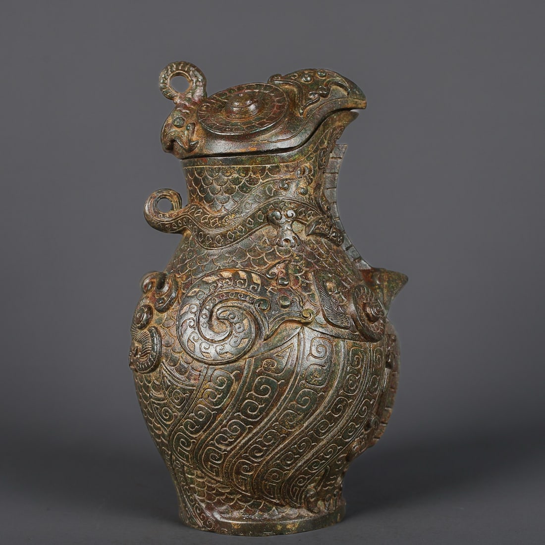 An Exquisite Chinese Bronze Man Gong Eagle Head Vase: Size: Height 27 cm - Width 17 cm |Materials: Bronze |Dynasty: zhou dynasty |Attribution: 700-BC |Object: Bell