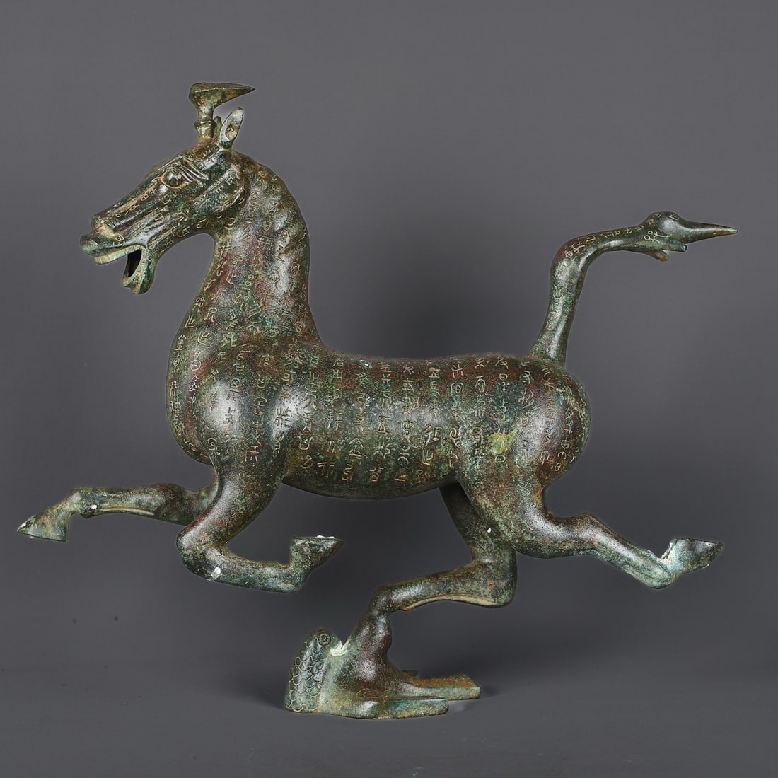 An Exquisite Chinese Bronze inscription Horse Treading on Flying Swallows: Size: Height 41 cm - Width 46 cm |Materials: Bronze |Dynasty: Han dynasty |Attribution: 1st to 3rd-C |Object: Bell