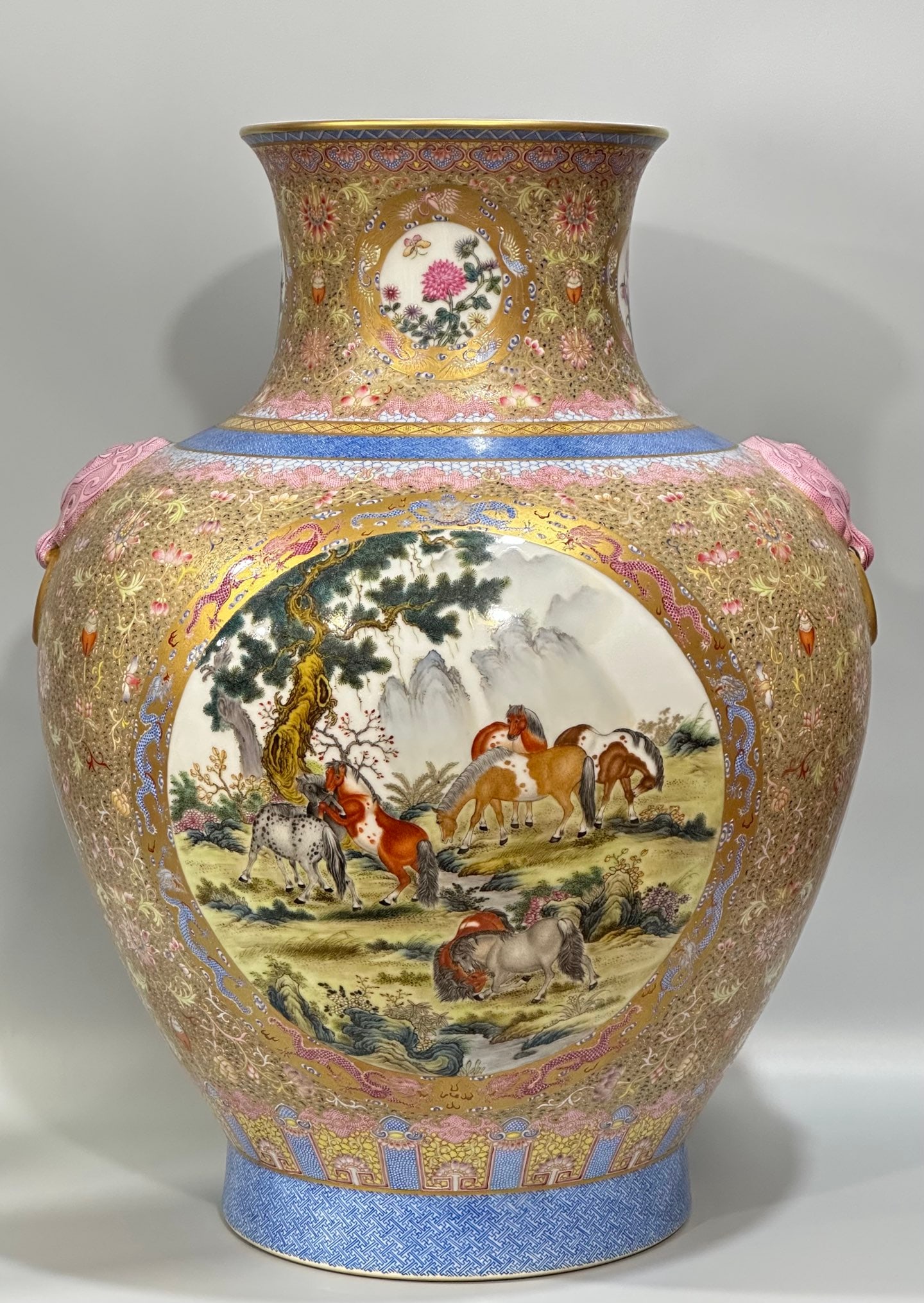 An Exquisite Chinese Enamel and gold animals flowers and birds two-eared vase: Size: Height 51 cm - Width 37.5 cm |Materials: Porcelain |Dynasty: Qing dynasty |Inscription: Qianlong Mark |Object: vase