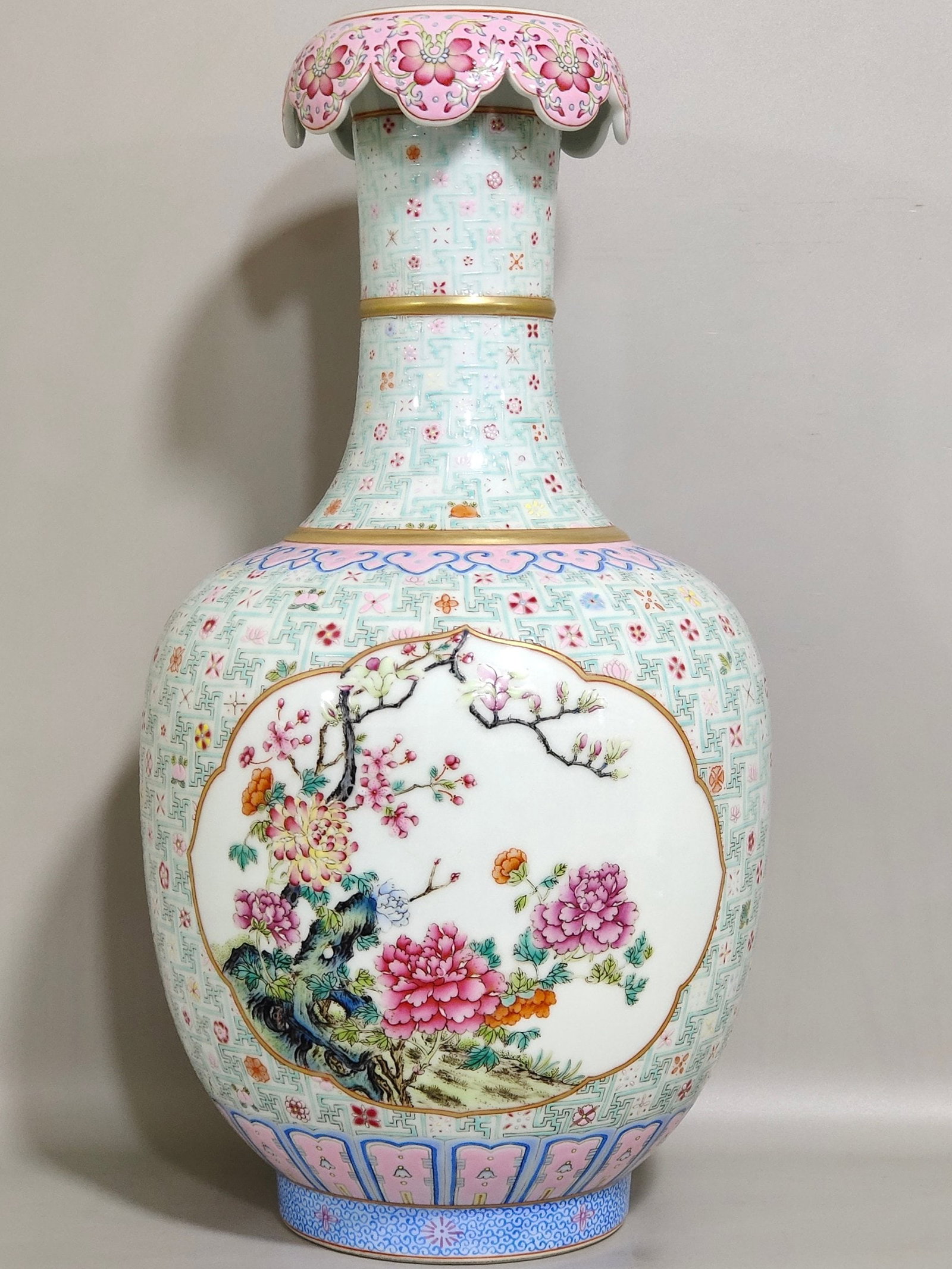 An Exquisite Chinese swastika pattern window flower inverted bottle: Size: Height 34.5 cm - Width 17 cm |Materials: Porcelain |Dynasty: Qing dynasty |Inscription: Qianlong Mark |Object: bottle