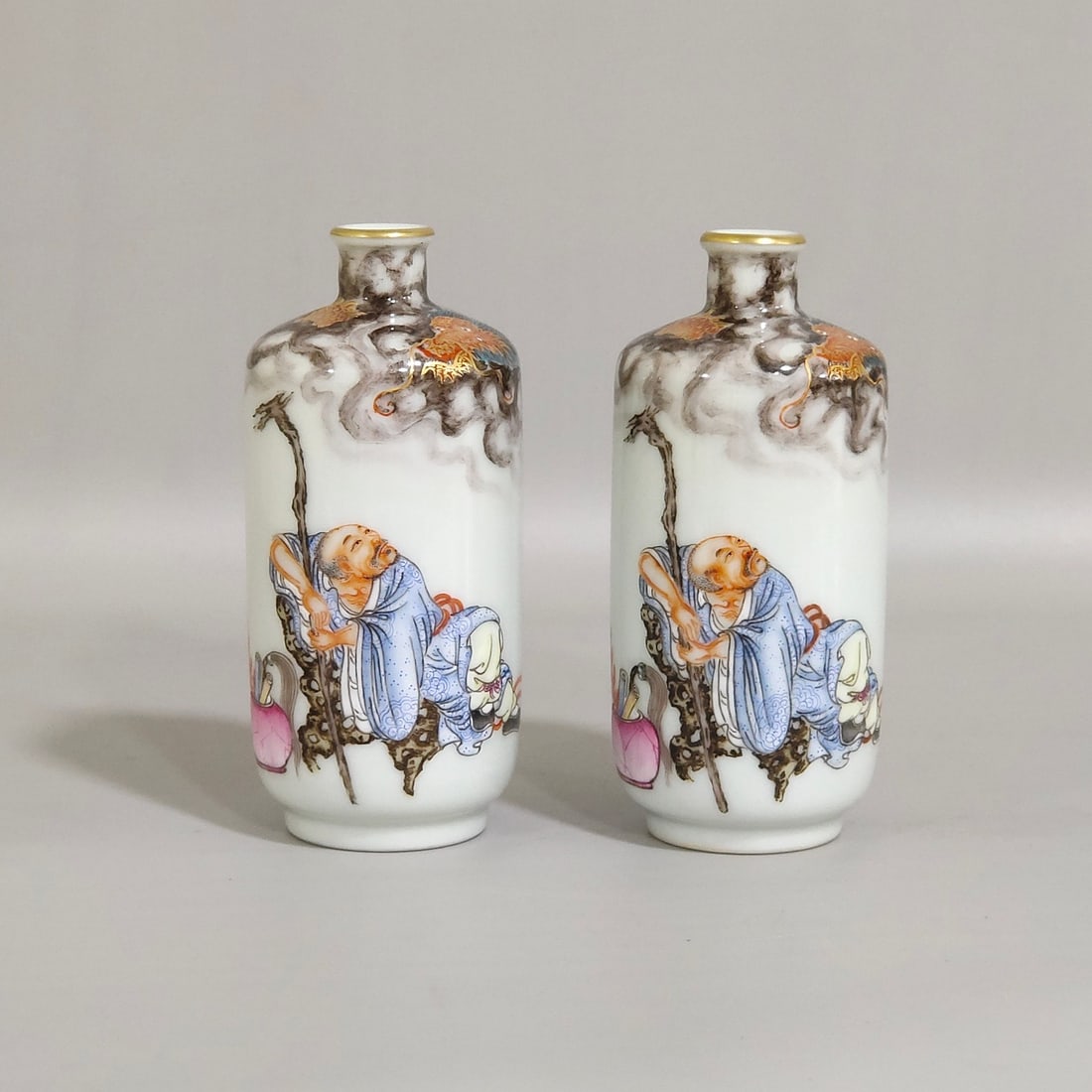 An Exquisite Chinese ink color subduing dragon and Arhat snuff bottle: Size: Height 8.5 cm - Width 4 cm Materials: Porcelain Dynasty: Qing dynasty Inscription: Qianlong Mark Object: bottle