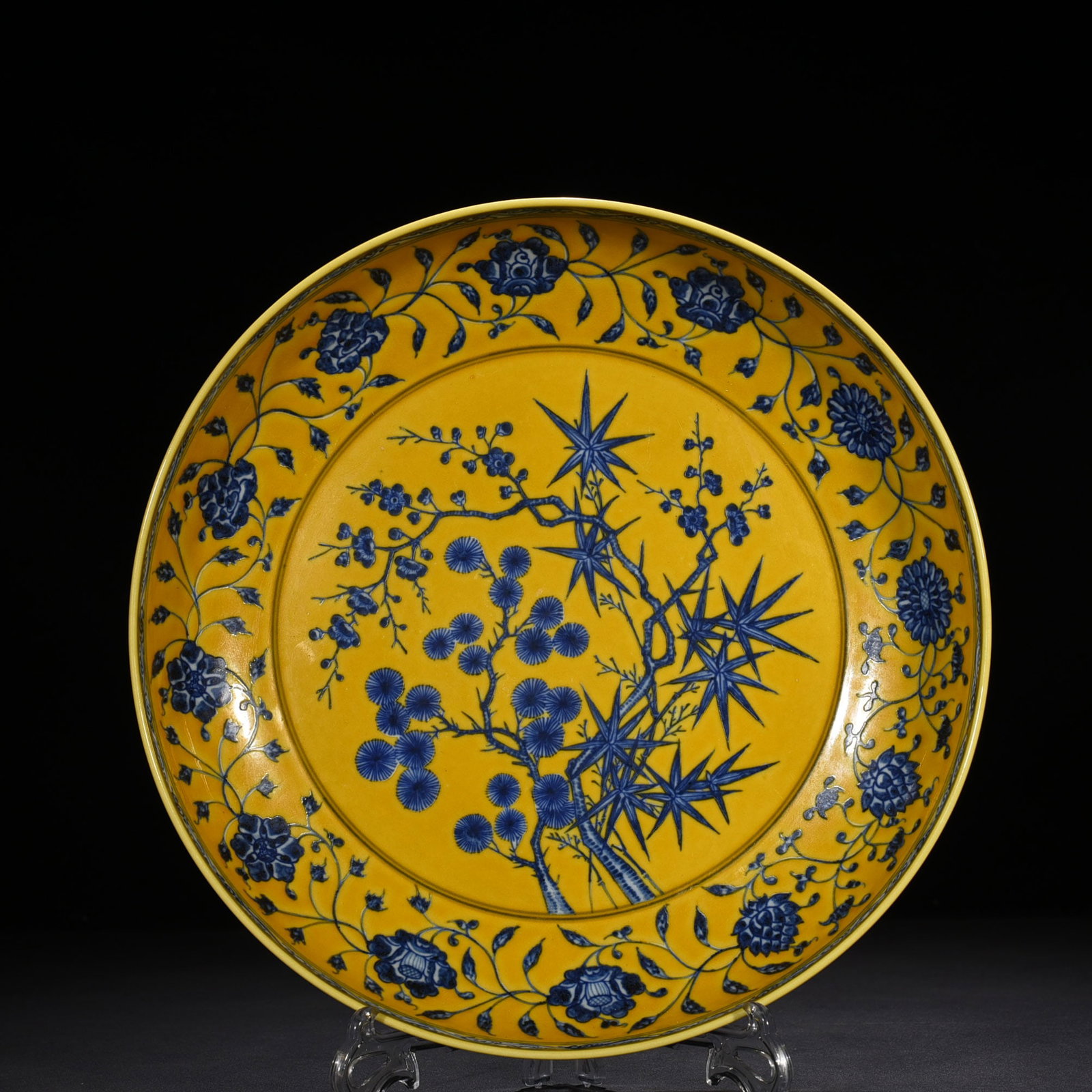 An Exquisite Chinese delicate yellow glaze blue and white pine bamboo and plum dish: Size: Height 6.5 cm - Widthh 34 cm Materials: Porcelain Dynasty: Ming Dynasty Attribution:Xuande Object: dish