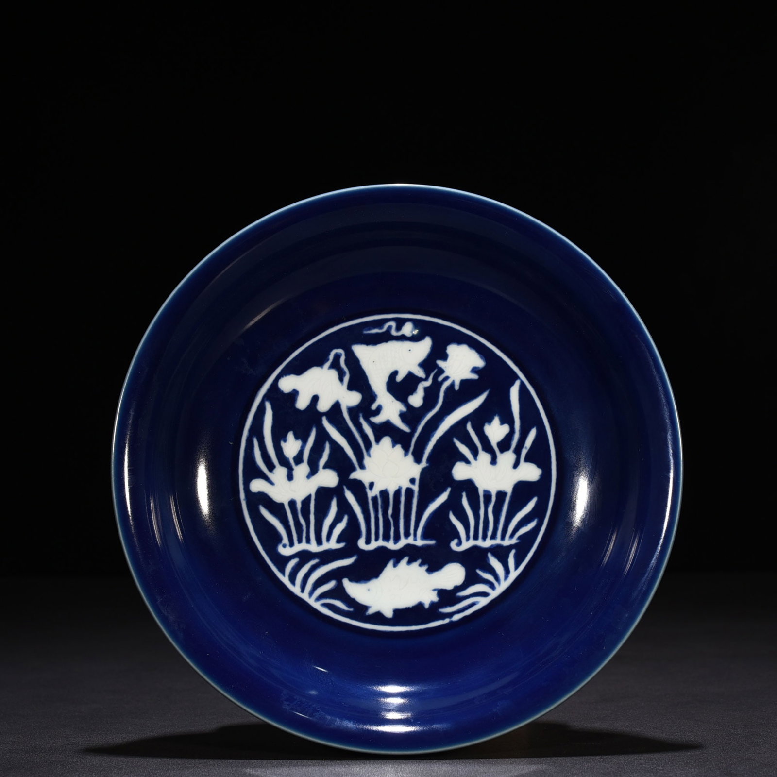 An Exquisite Chinese Blue Glaze Carved Plate: Size: Height 5 cm - Widthh 22 cm Materials: Porcelain Dynasty: Ming Dynasty Attribution:Xuande Object: plate