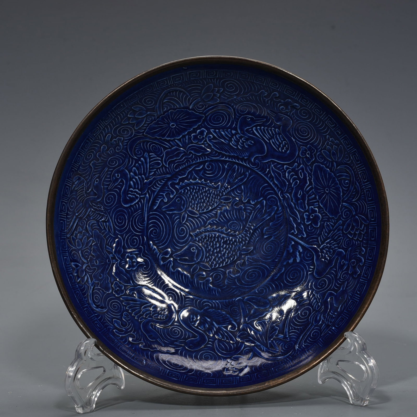 An Exquisite Chinese Ding kiln Dingzhou blue glaze plate inlaid with copper buckle: Size: Height 5 cm - Widthh 22 cm Materials: Porcelain Dynasty: Song Dynasty Attribution: 10th-C period Object: plate