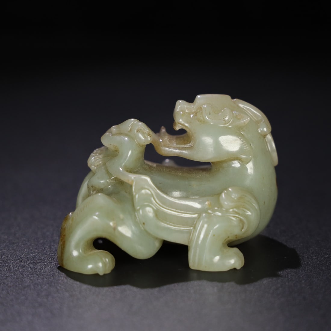 An Exquisite Chinese Natural Jade Carved Feathered Man and Beast (1 of 10)