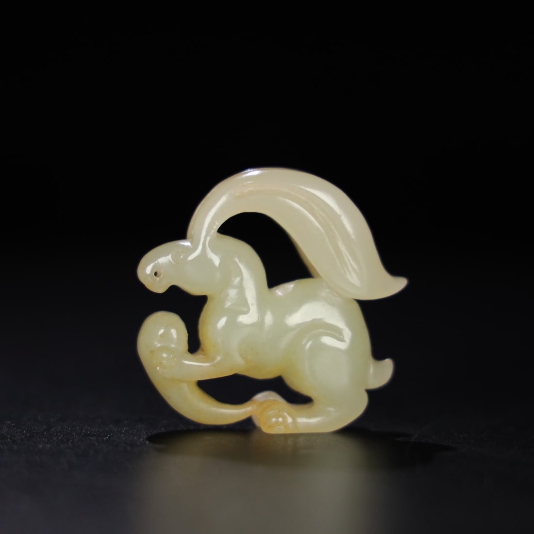 An Exquisite Chinese Natural Jade Carved Rabbit: Size: Width 5 cm - Height 4.9 cm Materials: Jade Dynasty: Qing dynasty Attribution: Qianlong Period Object: Rabbit