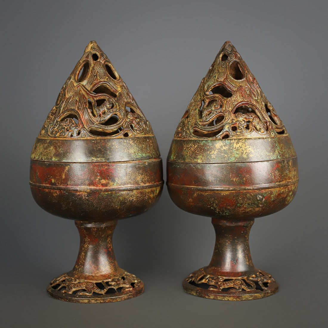 An Exquisite Chinese Pair of bronze Boshan furnaces: Size: Height 32 cm - Width 16 cm Materials: Bronze Dynasty: Han dynasty Attribution: 1st to 3rd-C Object: Bell