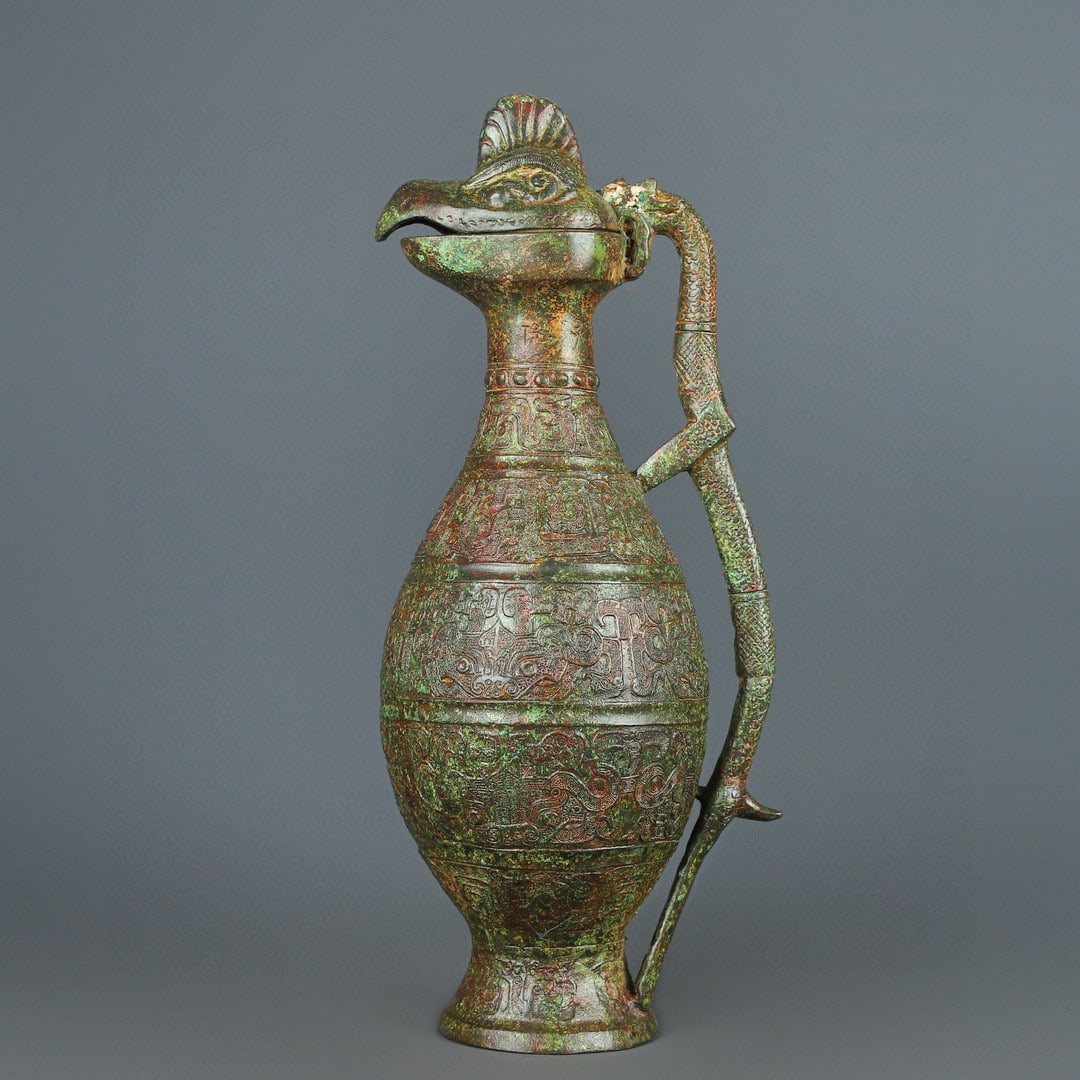 An Exquisite Chinese Bronze Gaolongfeng Liang: Size: Height 43.5 cm - Width 18 cm Materials: Bronze Dynasty: zhou dynasty Attribution: 700-BC Object: Bell