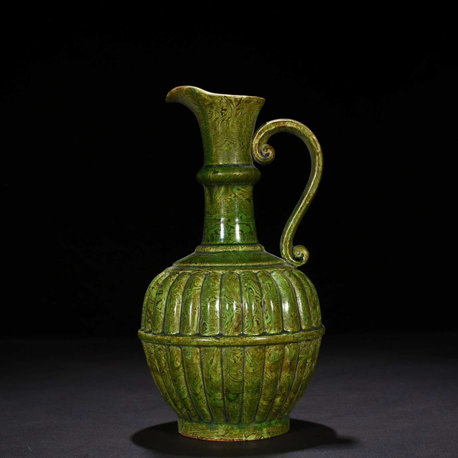 An Exquisite Chinese Dangyangyu kiln green glaze twisted tire vase: Size: Height 25 cm - Widthh 13 cm Materials: Porcelain Dynasty: Song Dynasty Attribution: 10th-C period Object: vase