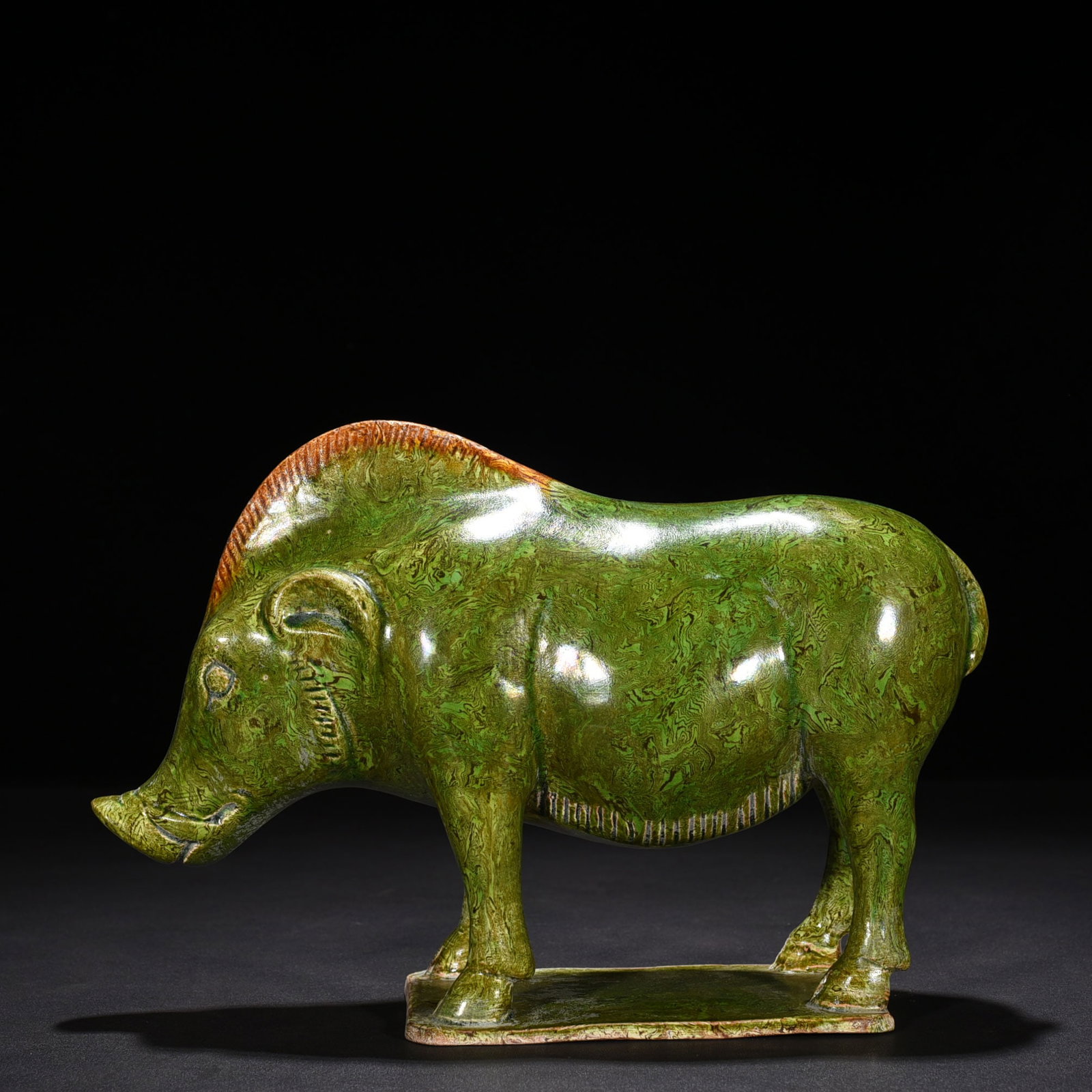 An Exquisite Chinese Kiln Green glaze twisted wild boar statue: Size: Height 17 cm - Widthh 25 cm Materials: Porcelain Dynasty: Song Dynasty Attribution: 10th-C period Object: statue