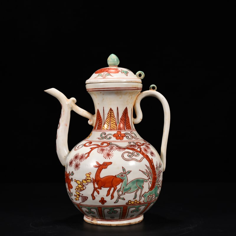An Exquisite Chinese multi colored pineAnd deer flower pattern ewer: Size: Height 22 cm - Widthh 18 cm Materials: Porcelain Dynasty: Ming Dynasty Attribution: Wanli Mark Object: ewer