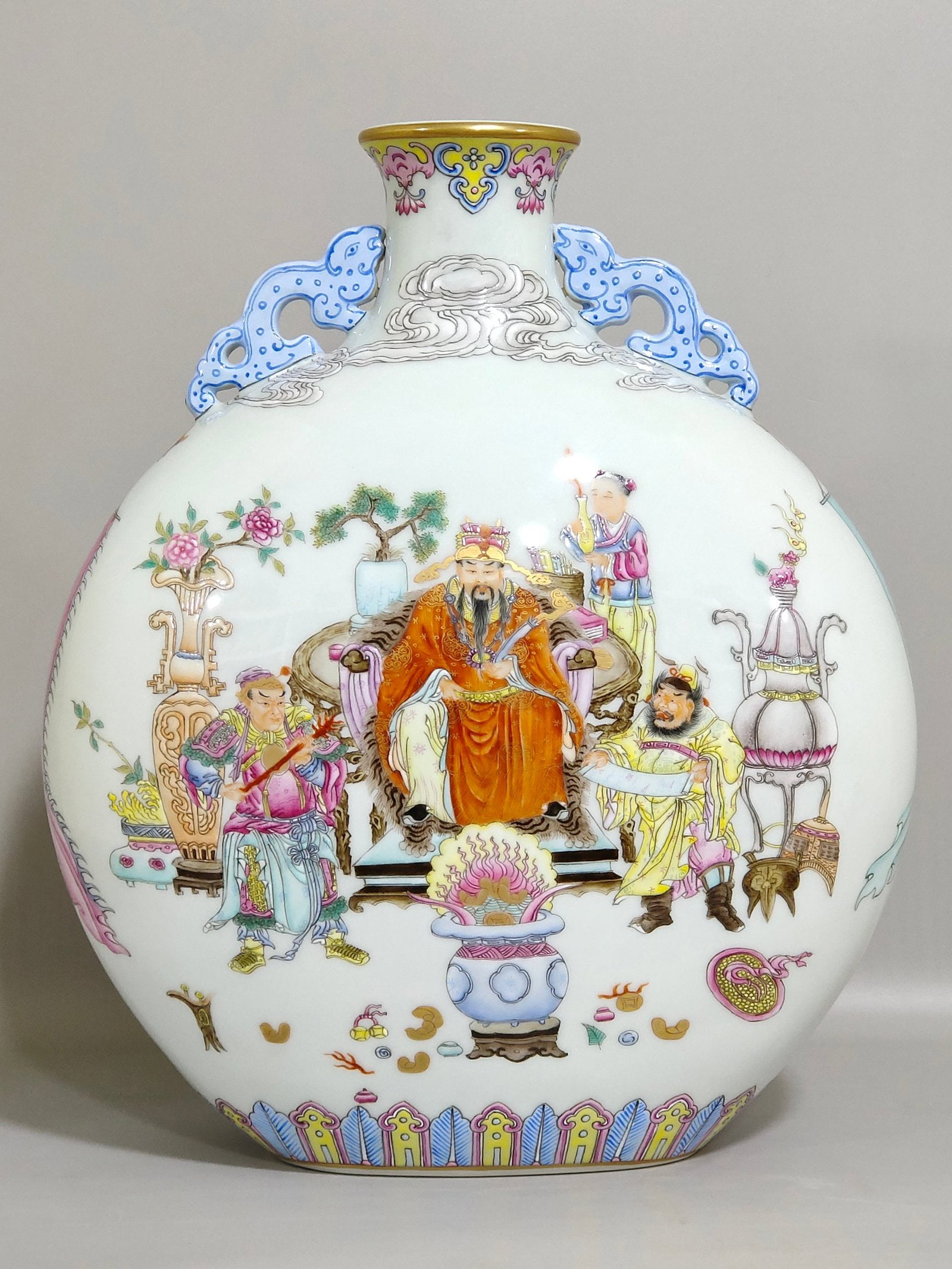 An Exquisite Chinese the two gods of the sunAnd moon holding the moon vase: Size: Height 29.5 cm - Width 24.5 cm Materials: Porcelain Dynasty: Qing dynasty Inscription: Qianlong Mark Object: vase