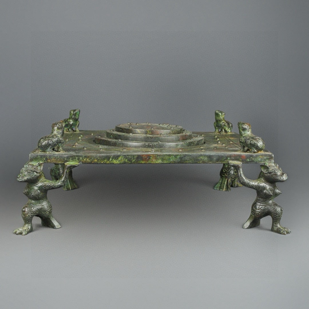 An Exquisite Chinese Bronze Astrology Compass: Size: Height 20 cm - Width 49 cm Materials: Bronze Dynasty: Han dynasty Attribution: 1st to 3rd-C Object: Bell