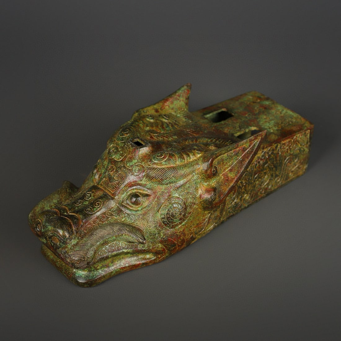 An Exquisite Chinese Bronze animal head horse drawn carriage accessories: Size: Height 10 cm - Width 28 cm Materials: Bronze Dynasty: zhou dynasty Attribution: 700-BC Object: Bell