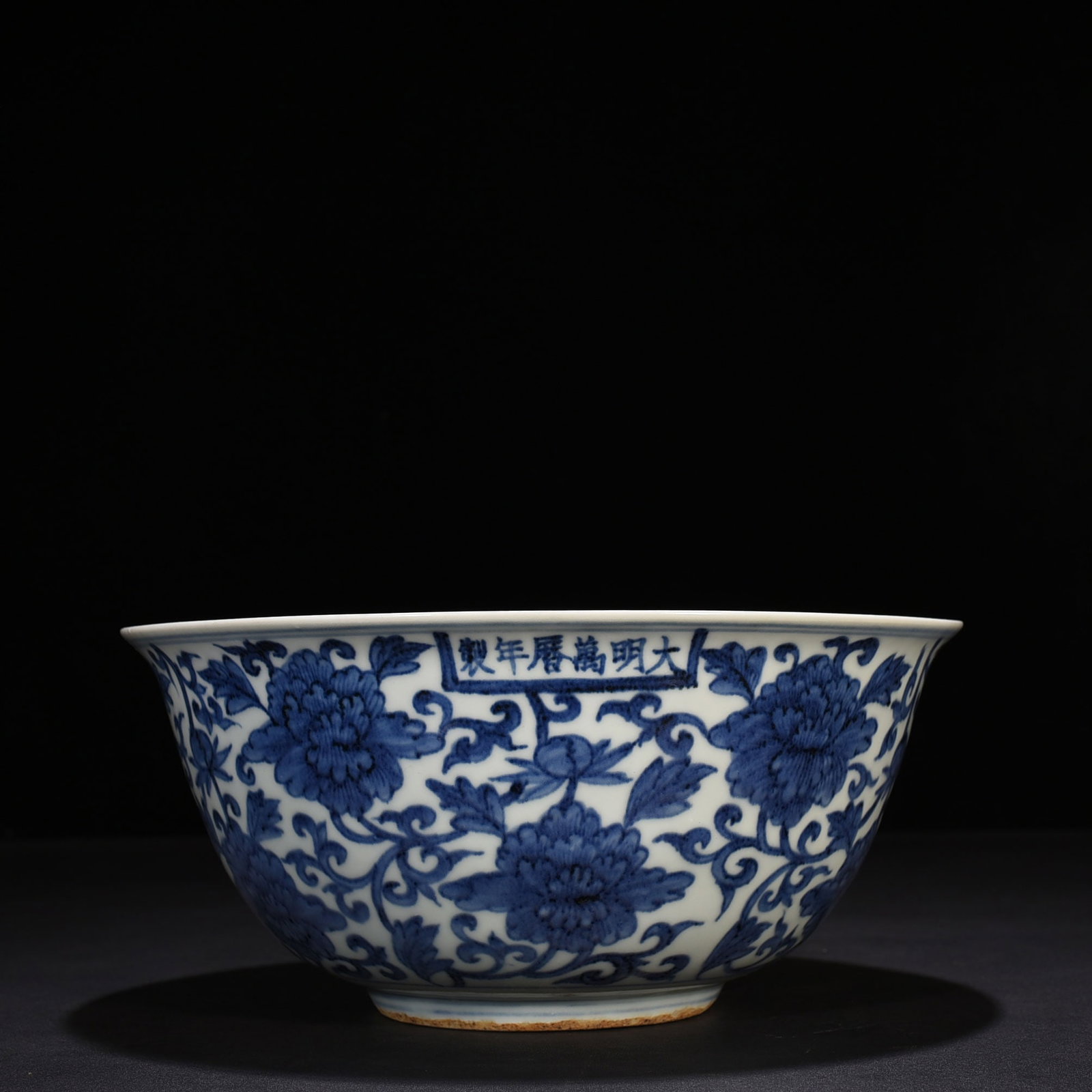An Exquisite Chinese blue and white bowl with floral patterns: Size: Height 12 cm - Widthh 26 cm Materials: Porcelain Dynasty: Ming Dynasty Attribution: Wanli Mark Object: bowl