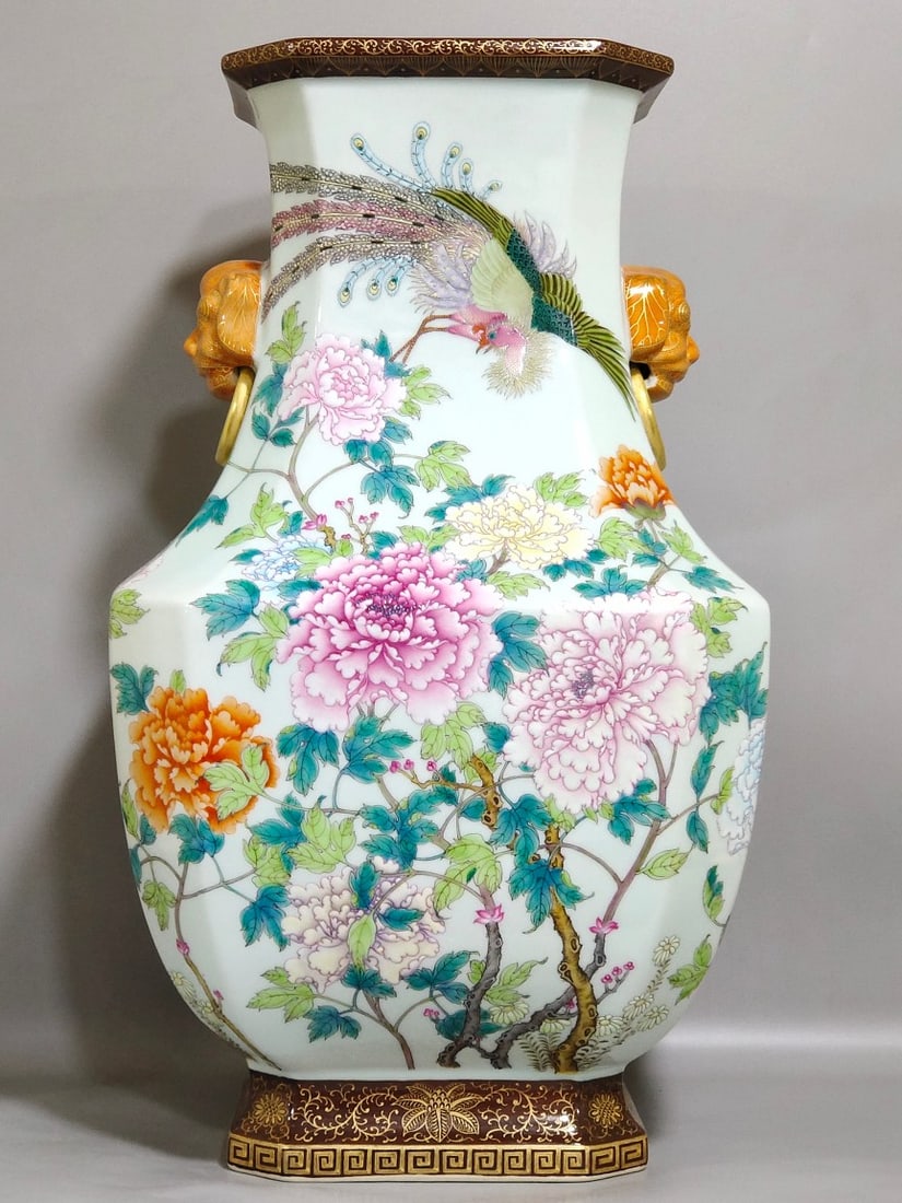 An Exquisite Chinese phoenix pierced with peoniesAnd eight sides of the ears: Size: Height 47 cm - Width 27.5 cm Materials: Porcelain Dynasty: Qing dynasty Inscription: Qianlong Mark Object: amphora