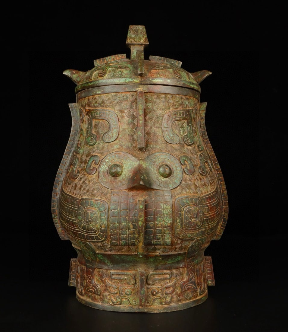 An Exquisite Chinese Bronze Eagle Face Wine Arrival: Size: Height 45 cm - Width 30 cm Materials: Bronze Dynasty: zhou dynasty Attribution: 700-BC Object: Bell